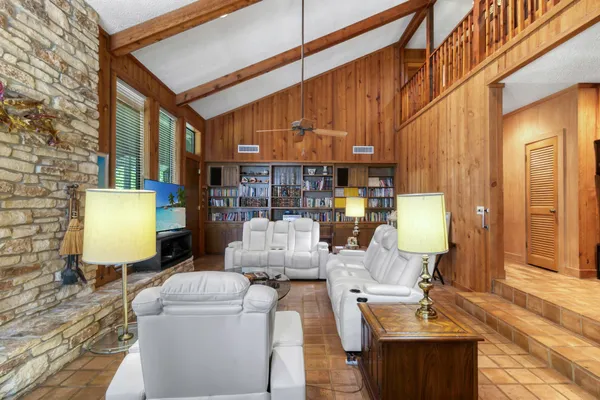 a kitchen that has a sink and a stove in it