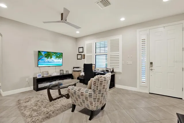 a living room with furniture and a window