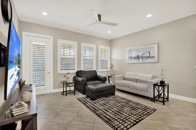 a living room with furniture and a window