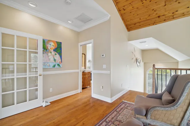 a balcony with wooden floor