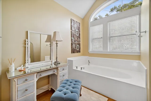 a bathroom with a granite countertop sink mirror and double