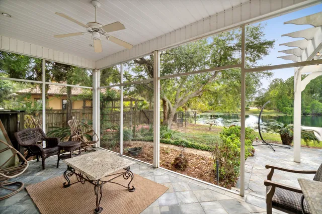 a wooden bench sitting next to a lake
