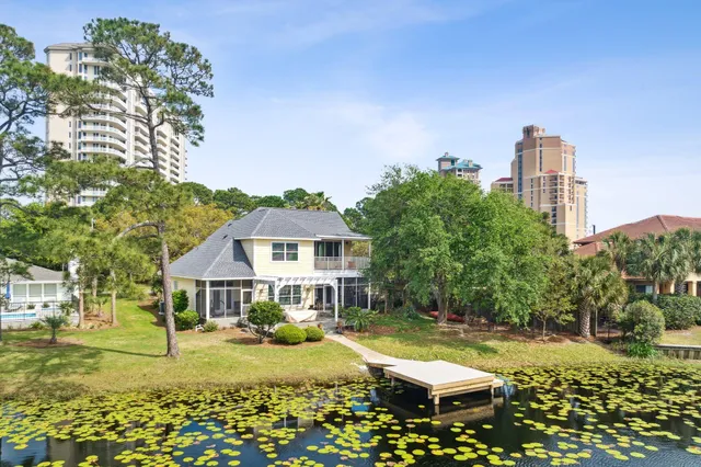 a utility room with sink dryer and washer