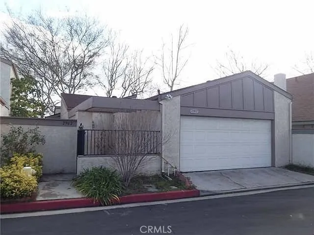 a house view with a garden