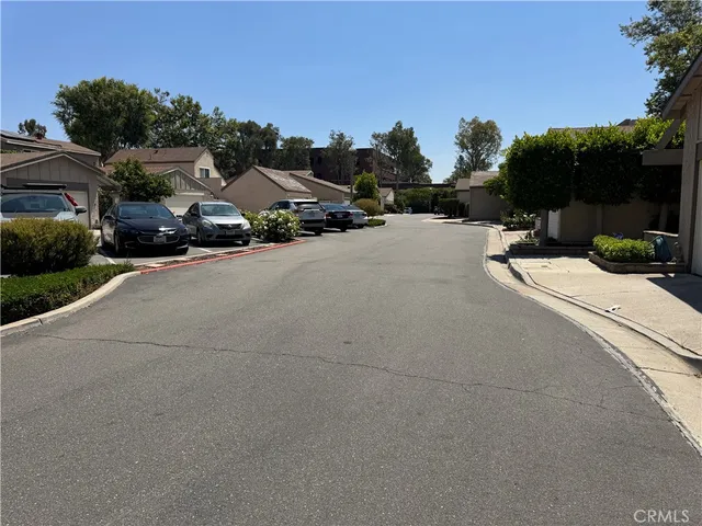a view of a street with houses