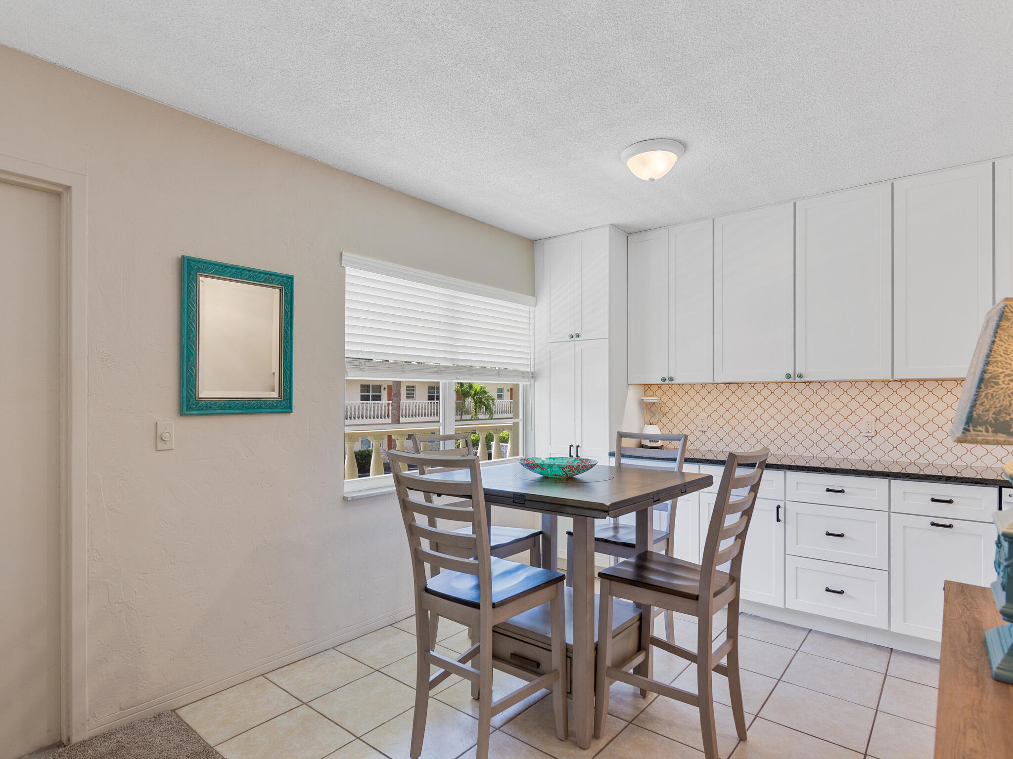 Undisclosed Address Vero Beach, FL 32960 - Photo 11 of 29 a view of a dining room with furniture