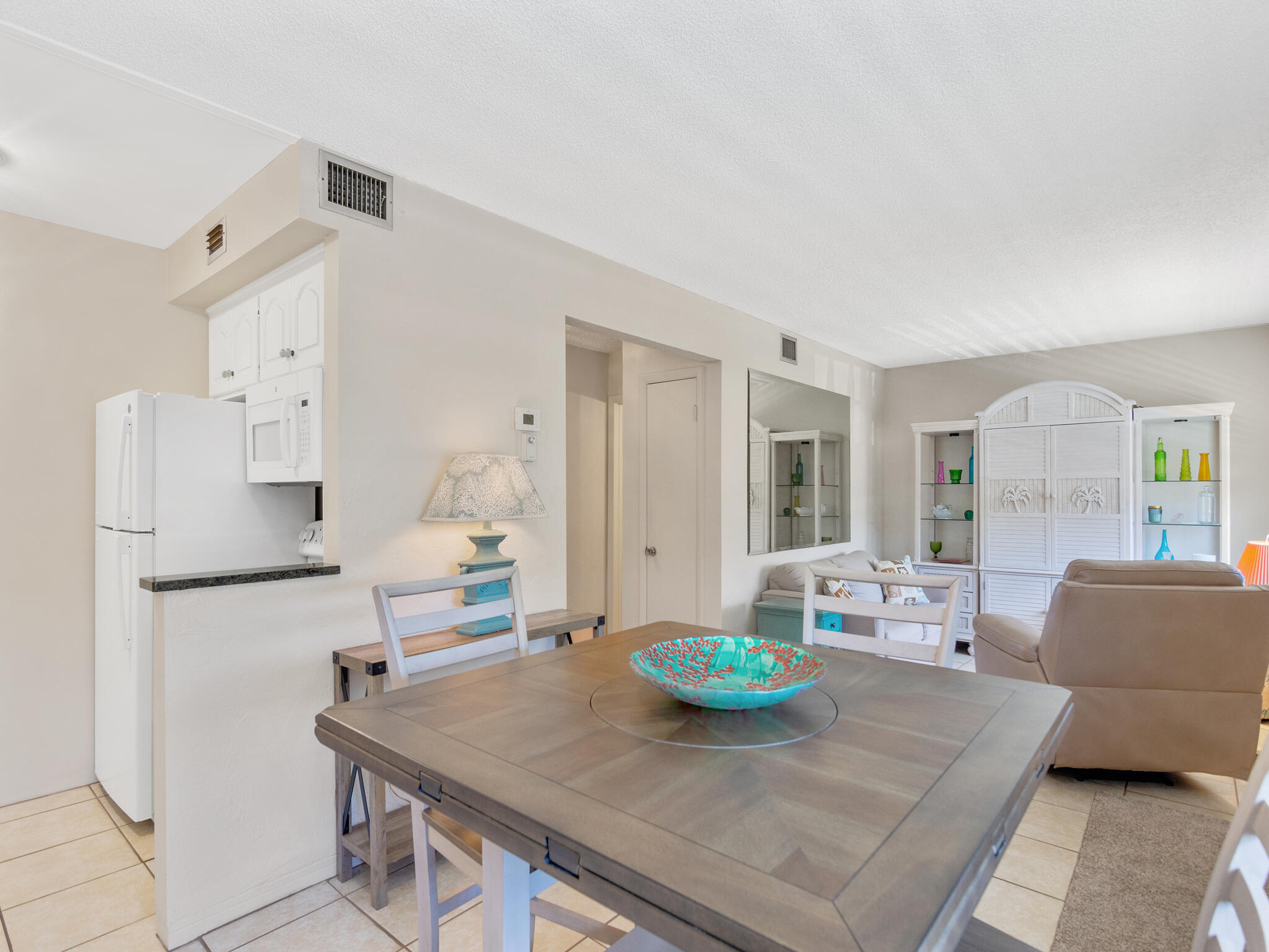 Undisclosed Address Vero Beach, FL 32960 - Photo 13 of 29 a living room with furniture and a table