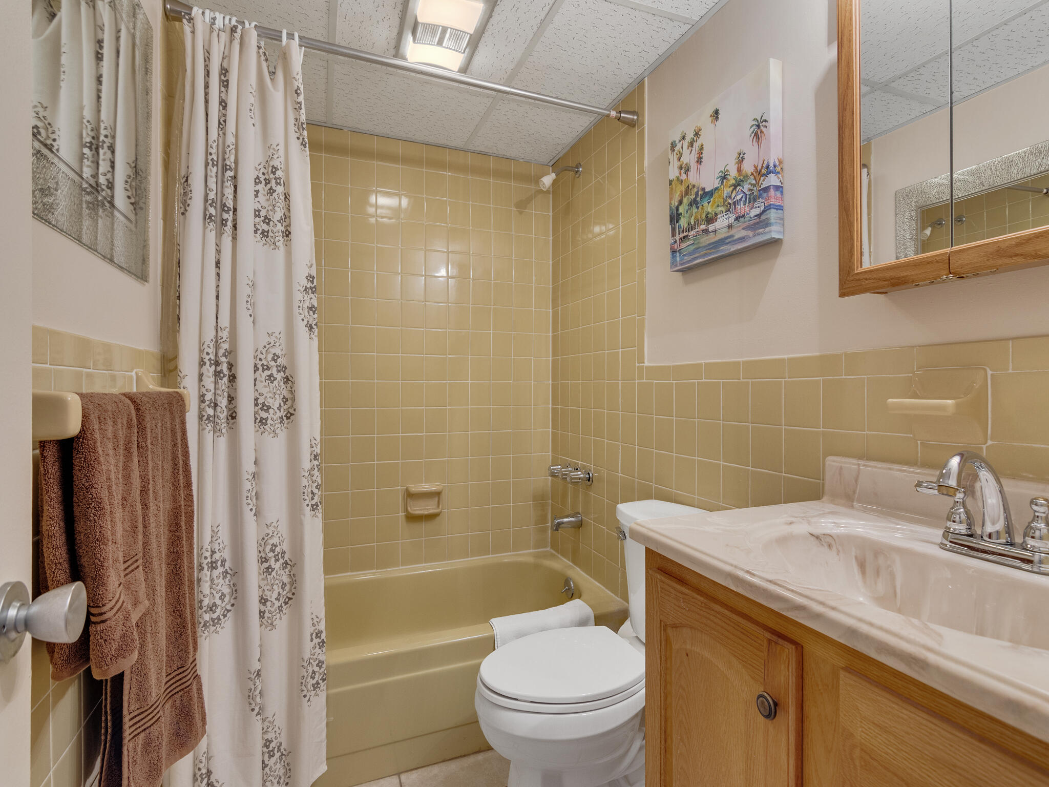 Undisclosed Address Vero Beach, FL 32960 - Photo 19 of 29 a bathroom with a sink a toilet and shower