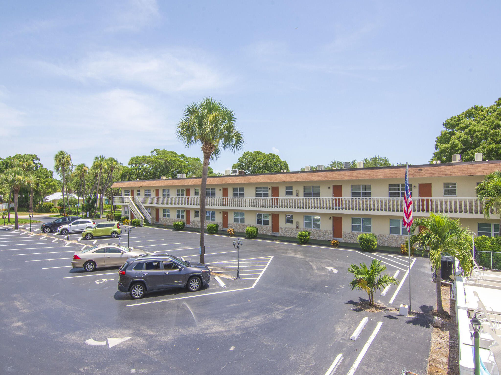 Undisclosed Address Vero Beach, FL 32960 - Photo 2 of 29 a view of a street with cars parked