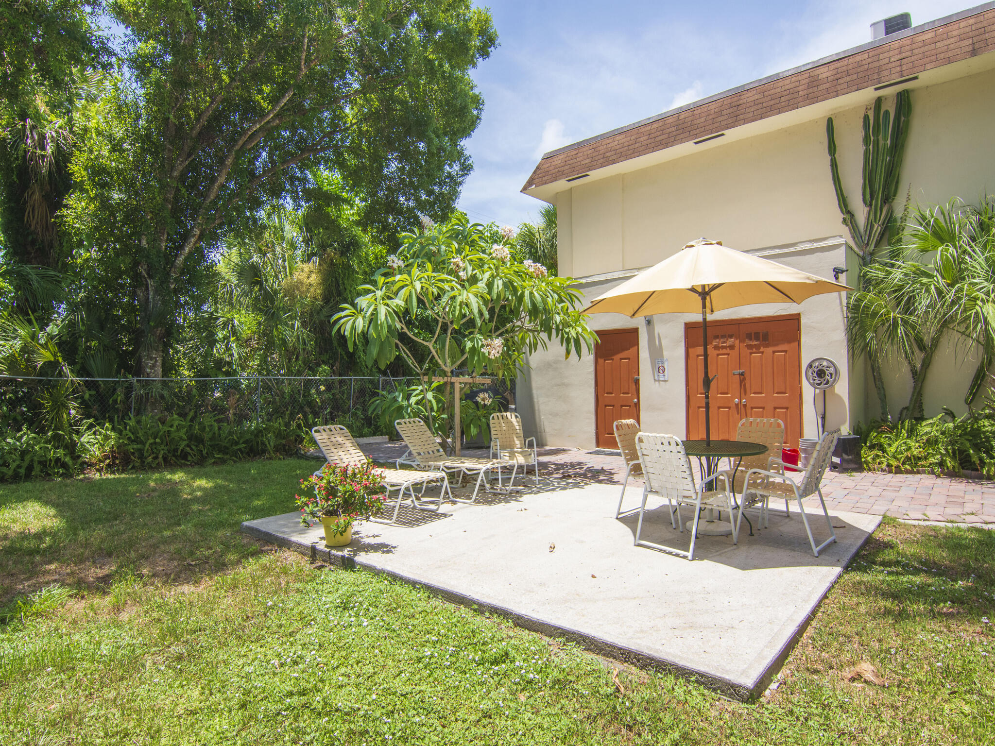 Undisclosed Address Vero Beach, FL 32960 - Photo 28 of 29 a view of a house with backyard porch and sitting area