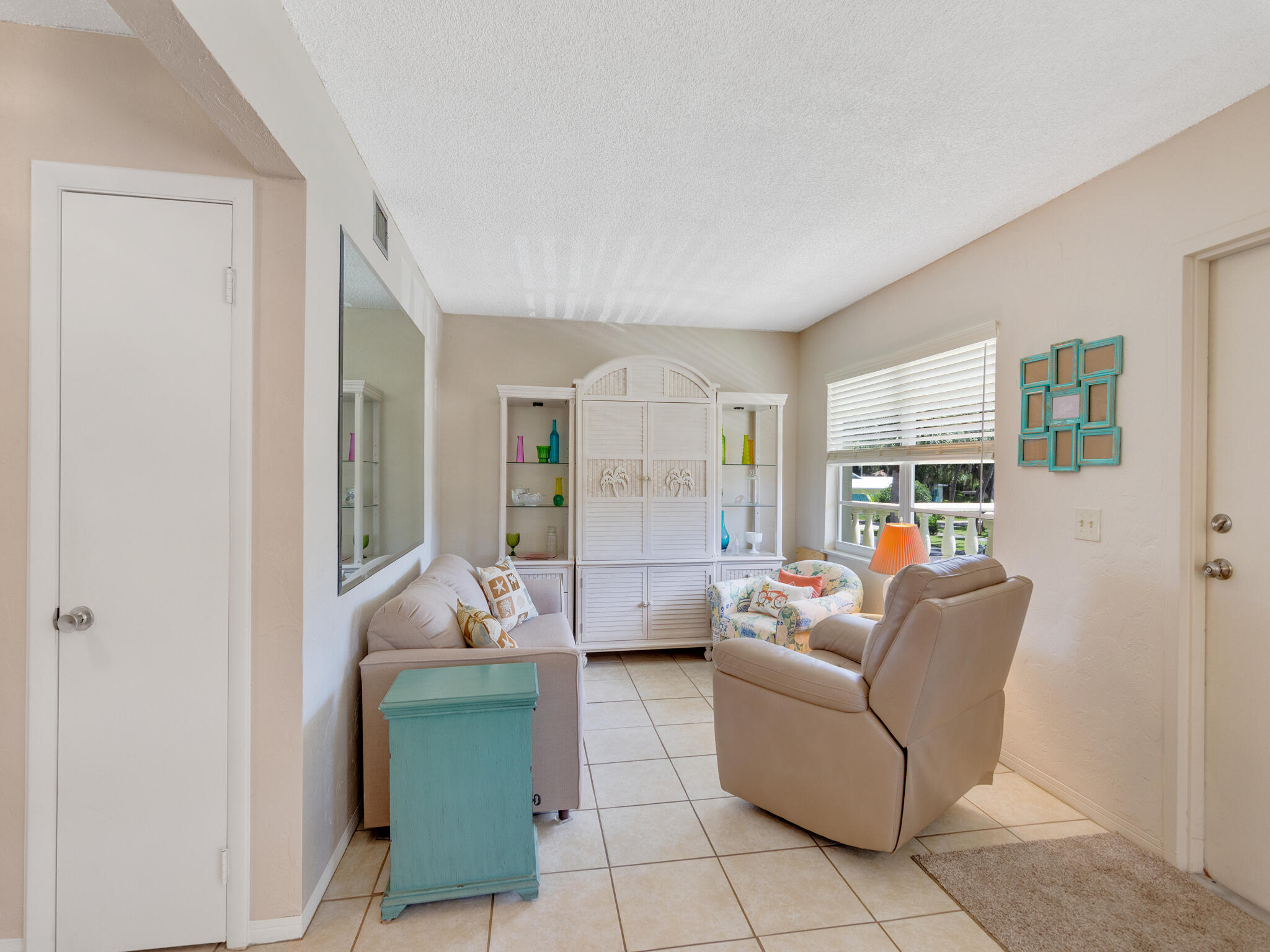 Undisclosed Address Vero Beach, FL 32960 - Photo 6 of 29 a living room with furniture and a large window