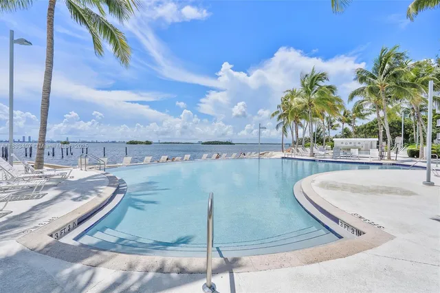 a view of a swimming pool with a terrace