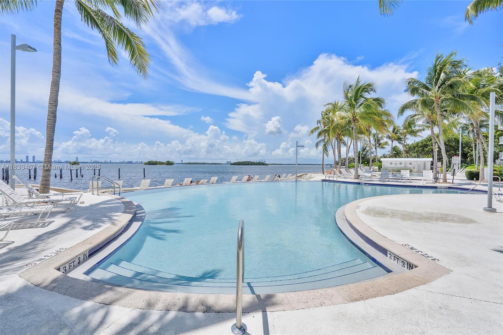 650 Northeast 64th Street, Unit G210 Miami, FL 33138 - Photo 2 of 25 a view of a swimming pool with a terrace