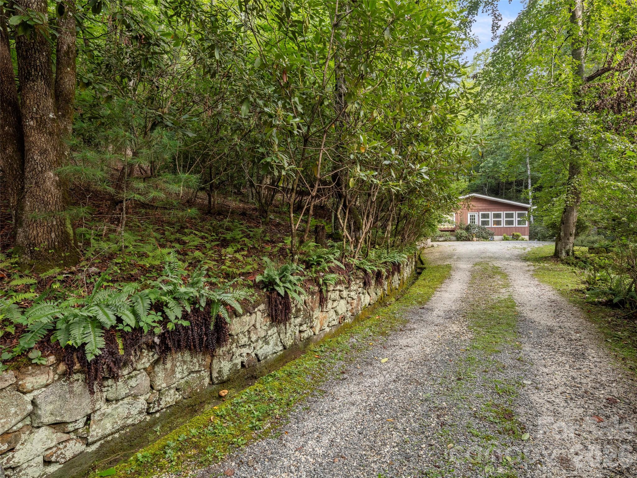 812 Crab Creek Road Hendersonville, NC 28739 - Photo 20 of 33 a view of street with trees