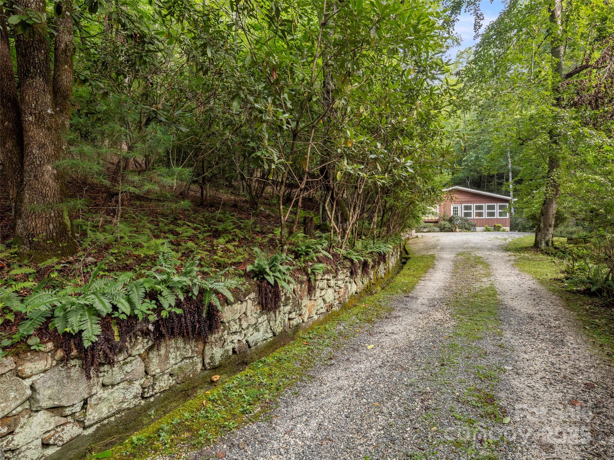 812 Crab Creek Road Hendersonville, NC 28739 - Photo 21 of 34 a view of street with trees