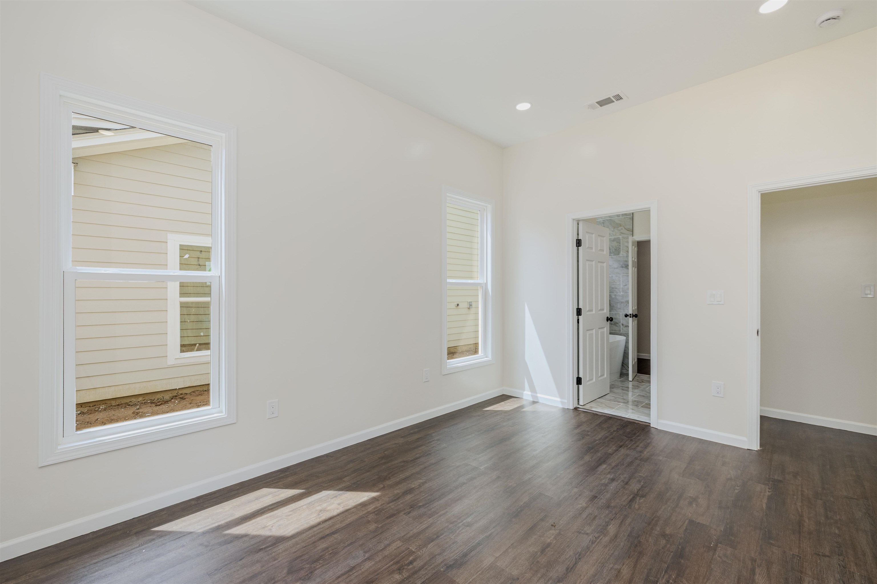 1069 Shaw Place Memphis, TN 38126 - Photo 15 of 23 a view of a livingroom with wooden floor and window