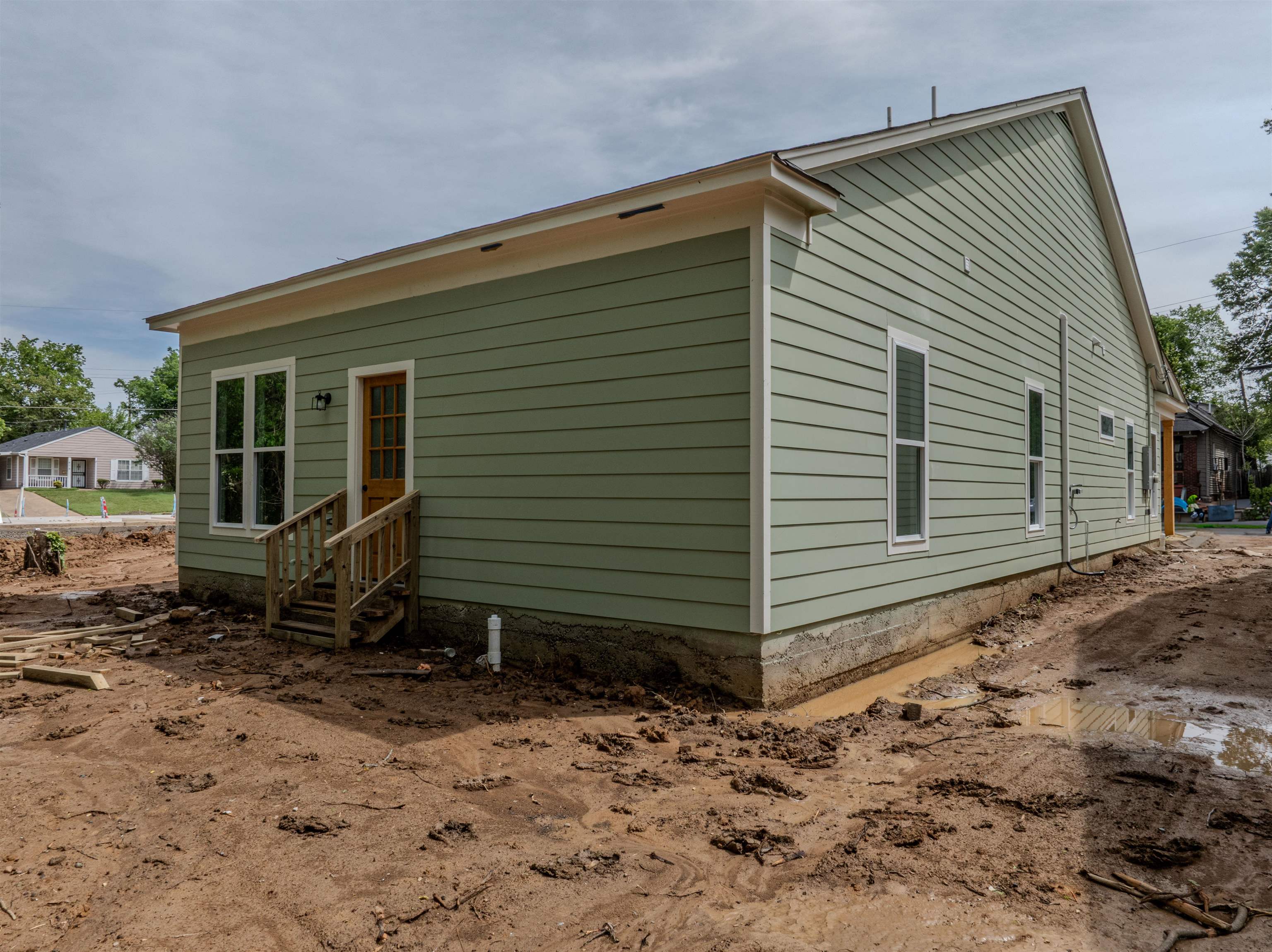 1069 Shaw Place Memphis, TN 38126 - Photo 19 of 23 a front view of a house with a yard