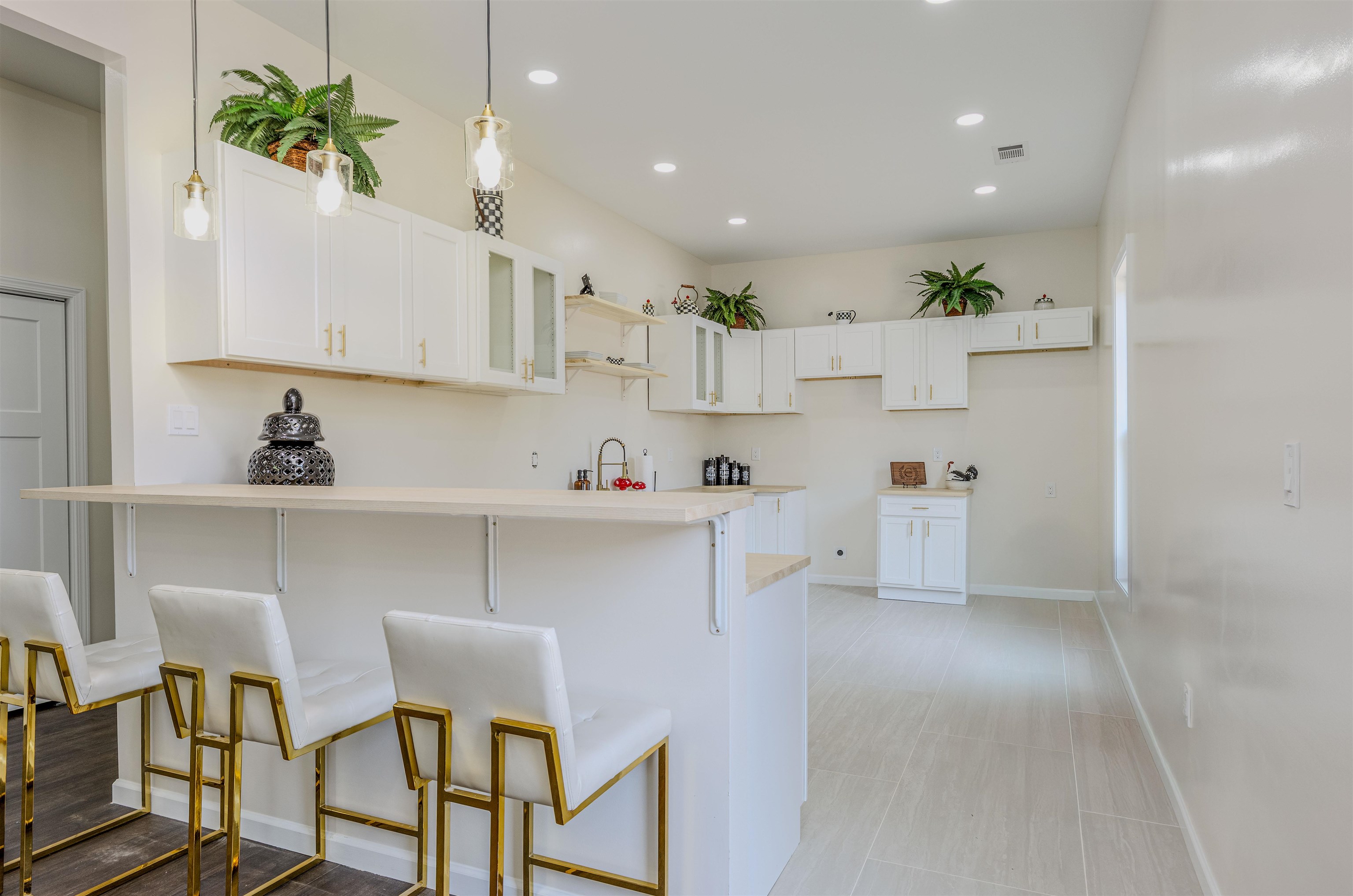 1069 Shaw Place Memphis, TN 38126 - Photo 6 of 23 a kitchen with stainless steel appliances cabinets and a refrigerator