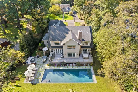 a view of house with yard