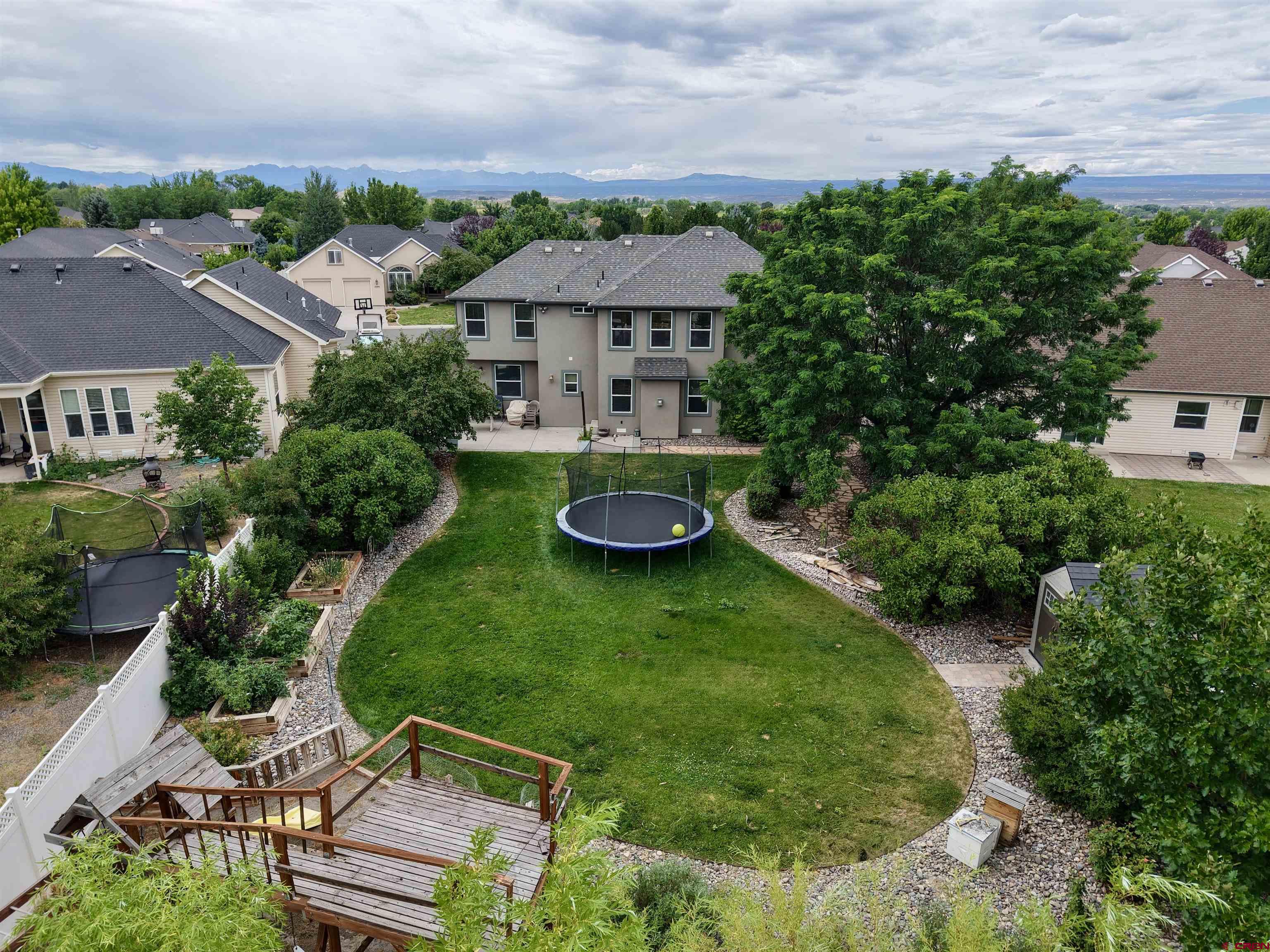 2941 Lost Creek Road North Montrose, CO 81401 - Photo 11 of 45 an aerial view of a house with garden space and street view