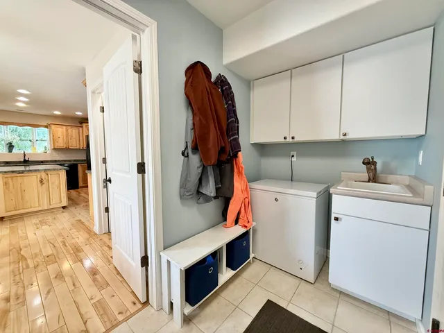a view of kitchen and utility room