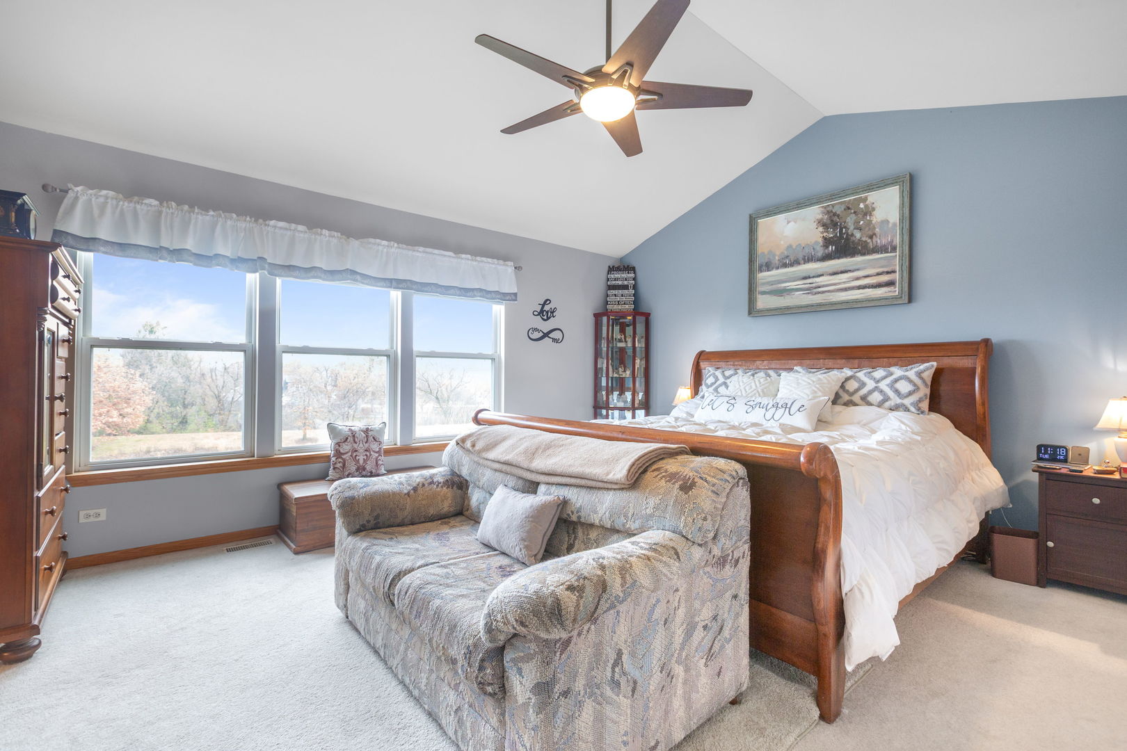 105 Inverness Court Round Lake, IL 60073 - Photo 16 of 31 a spacious bedroom with a large bed and a window