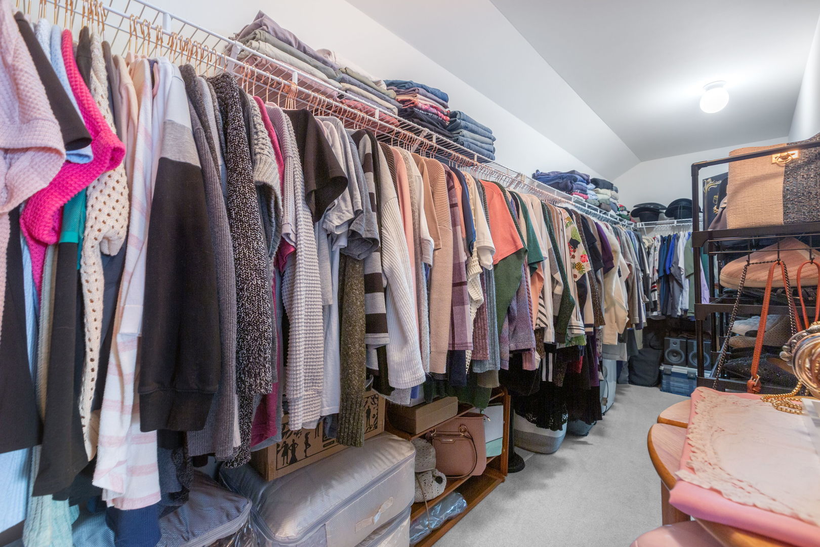 105 Inverness Court Round Lake, IL 60073 - Photo 20 of 31 a view of walk in closet with clothes and shoes