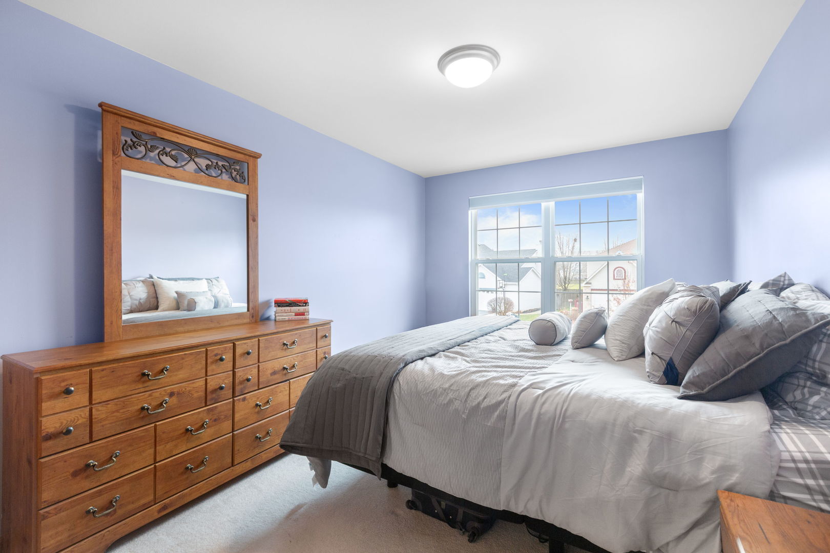 105 Inverness Court Round Lake, IL 60073 - Photo 21 of 31 a bedroom with a large bed and a window