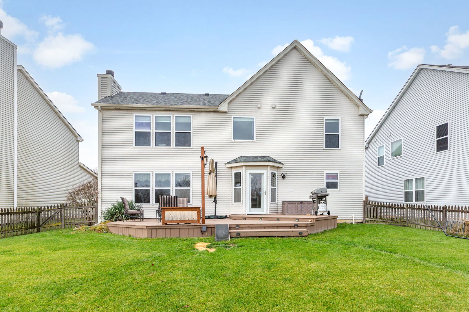105 Inverness Court Round Lake, IL 60073 - Photo 25 of 31 a view of a house with a backyard