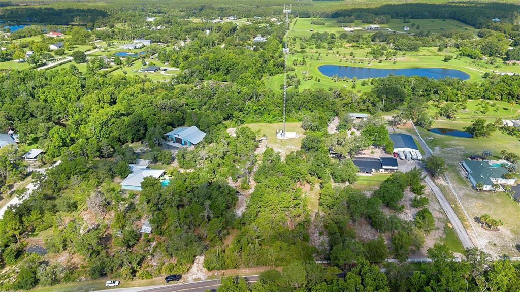 1835 South Glencoe Road New Smyrna Beach, FL 32168 - Photo 25 of 29 a view of a garden