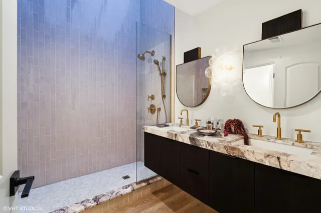 a bathroom with a sink and mirror