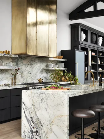 a kitchen with a stove and a sink