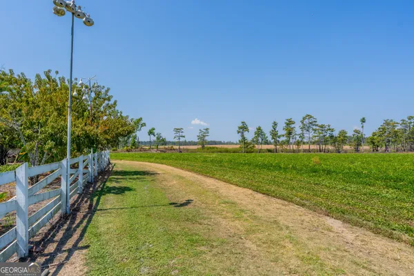 a view of swimming pool from a balcony