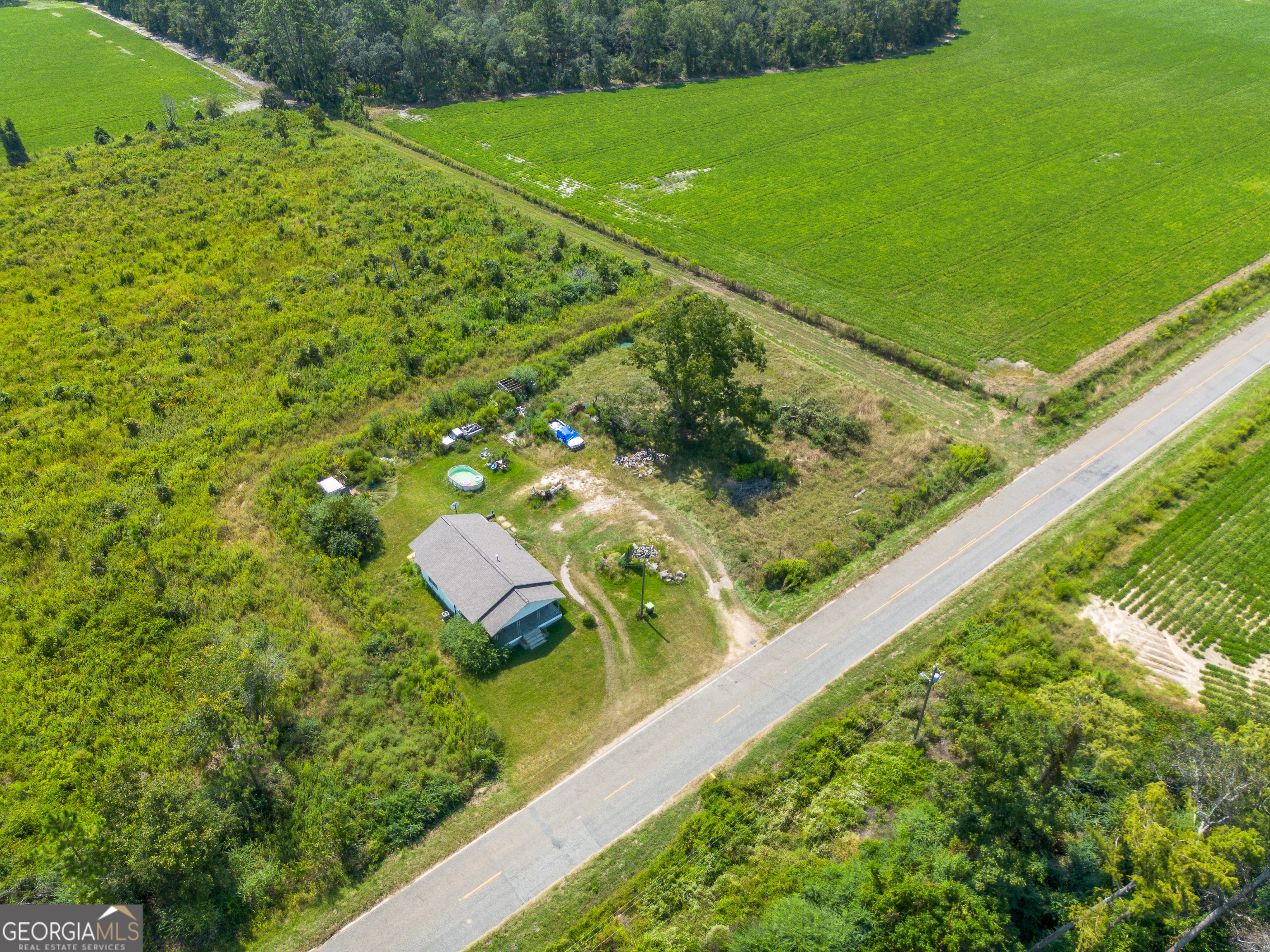 1671 Warren Carter Road Douglas, GA 31533 - Photo 24 of 57 a view of a garden from a balcony