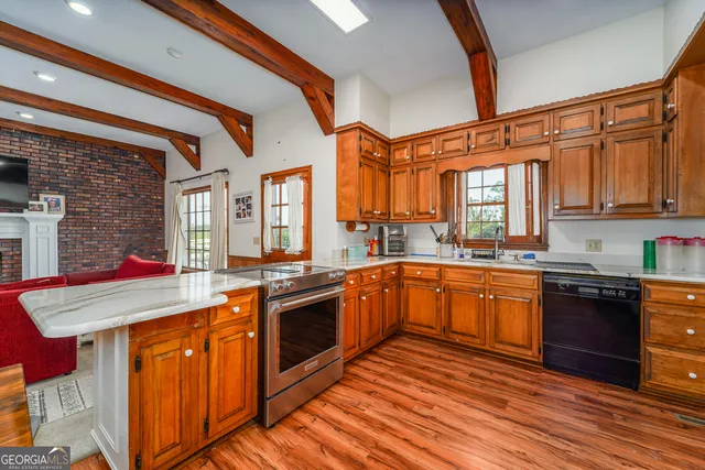 a bedroom with a bed and a desk