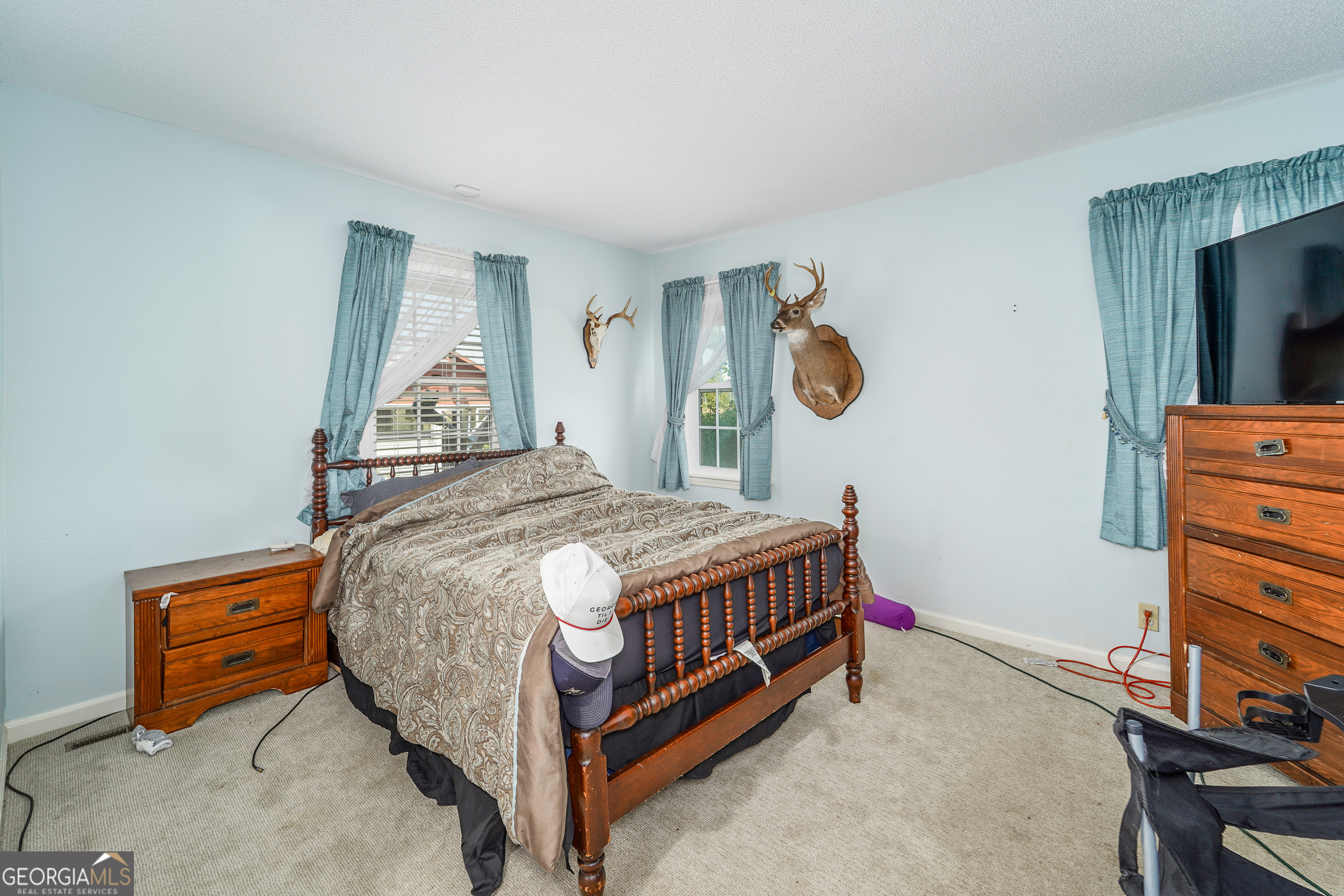 1671 Warren Carter Road Douglas, GA 31533 - Photo 41 of 57 a bedroom with a bed and a window