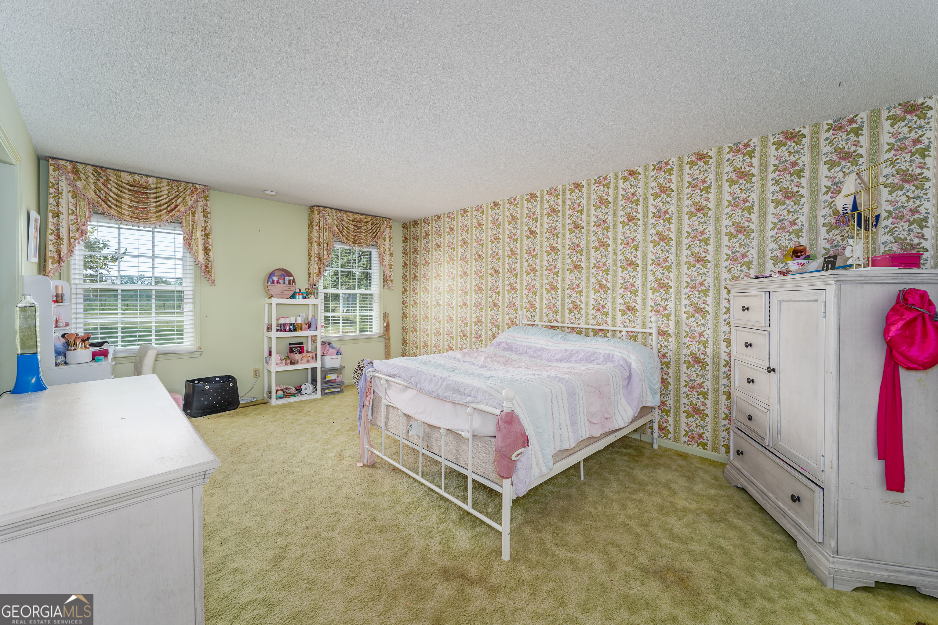 1671 Warren Carter Road Douglas, GA 31533 - Photo 45 of 57 a bedroom with a bed and a window
