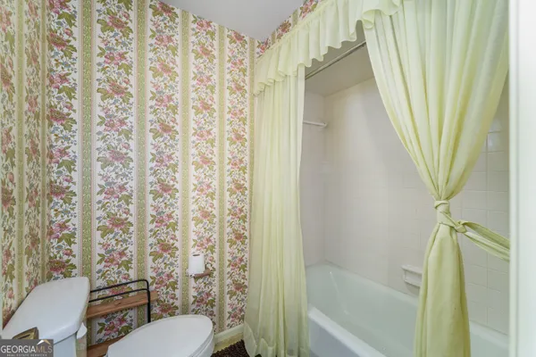 a bathroom with a sink and a shower