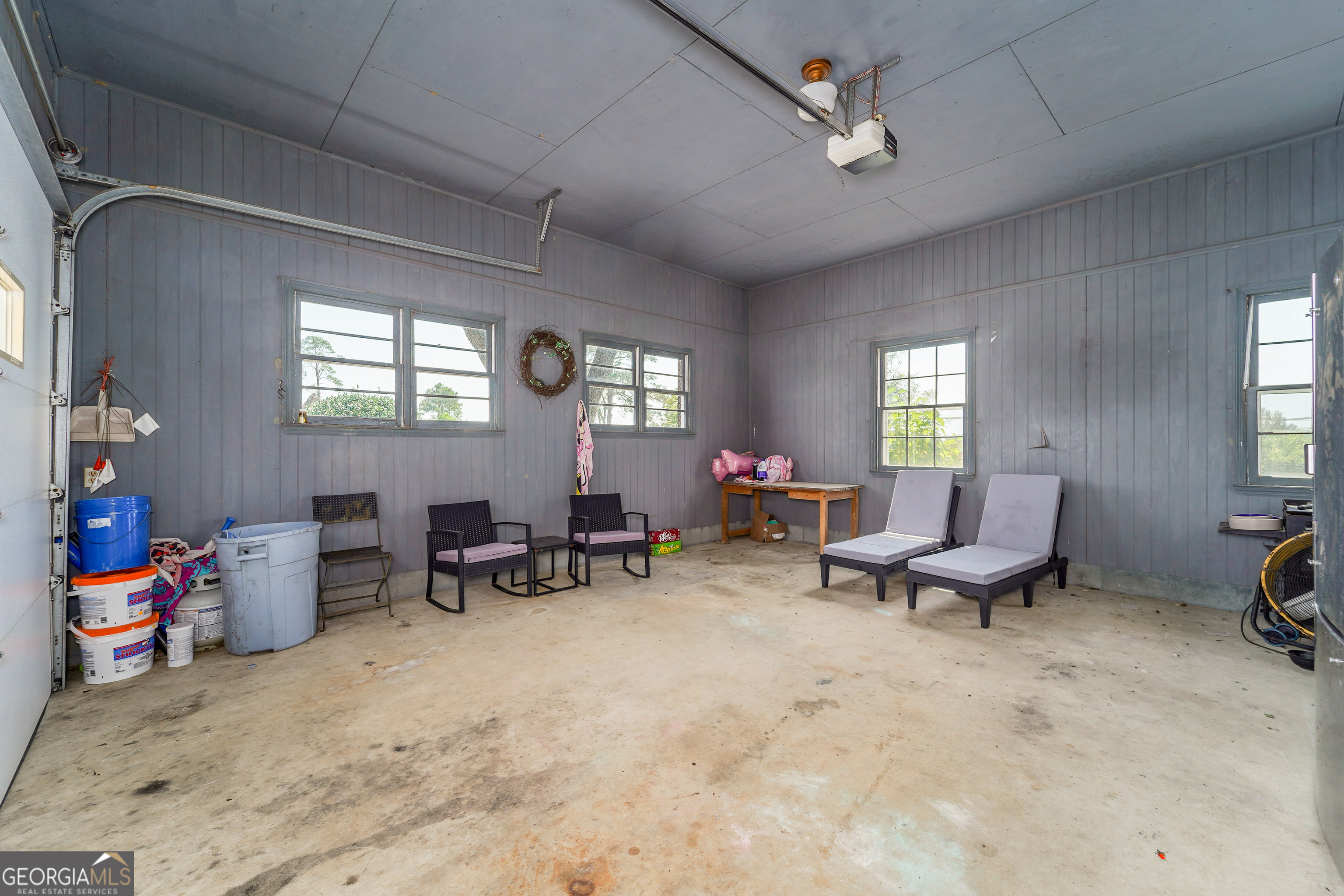 1671 Warren Carter Road Douglas, GA 31533 - Photo 55 of 57 a living room with furniture and a window