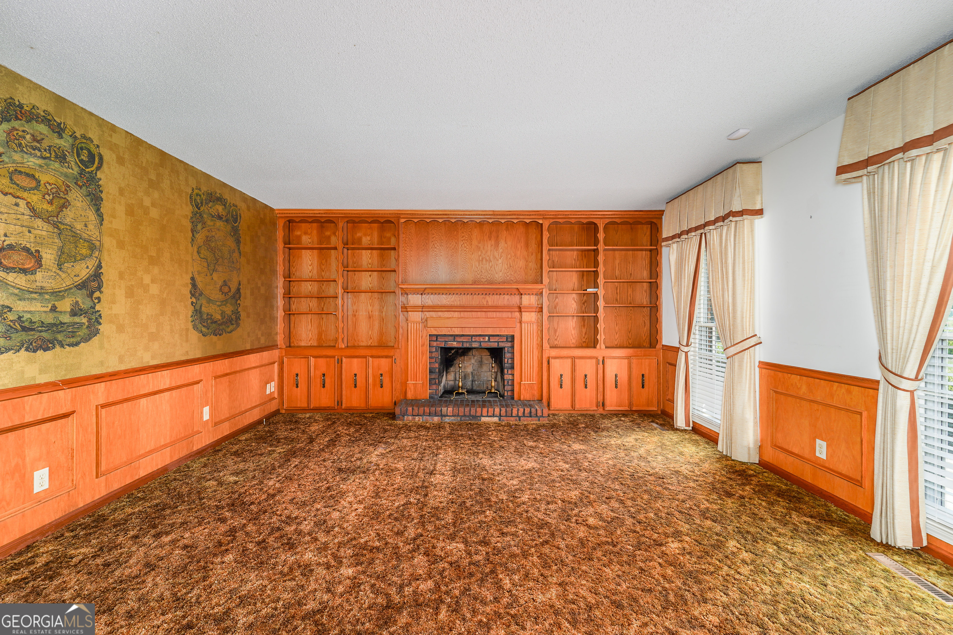 1671 Warren Carter Road Douglas, GA 31533 - Photo 56 of 57 a view of an empty room with a fireplace