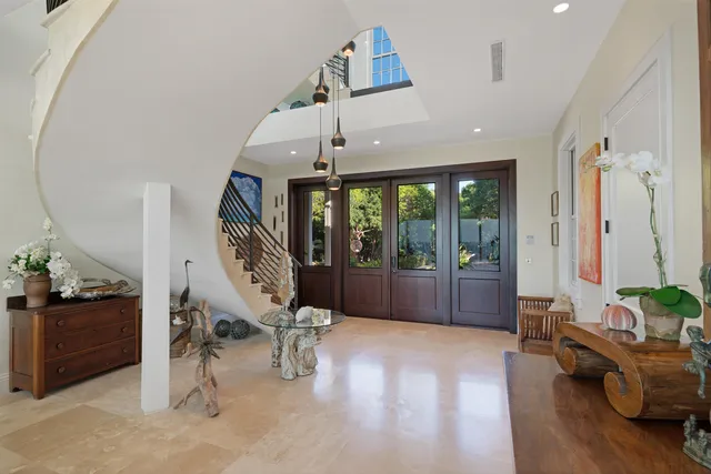 a view of a dining room with furniture and window