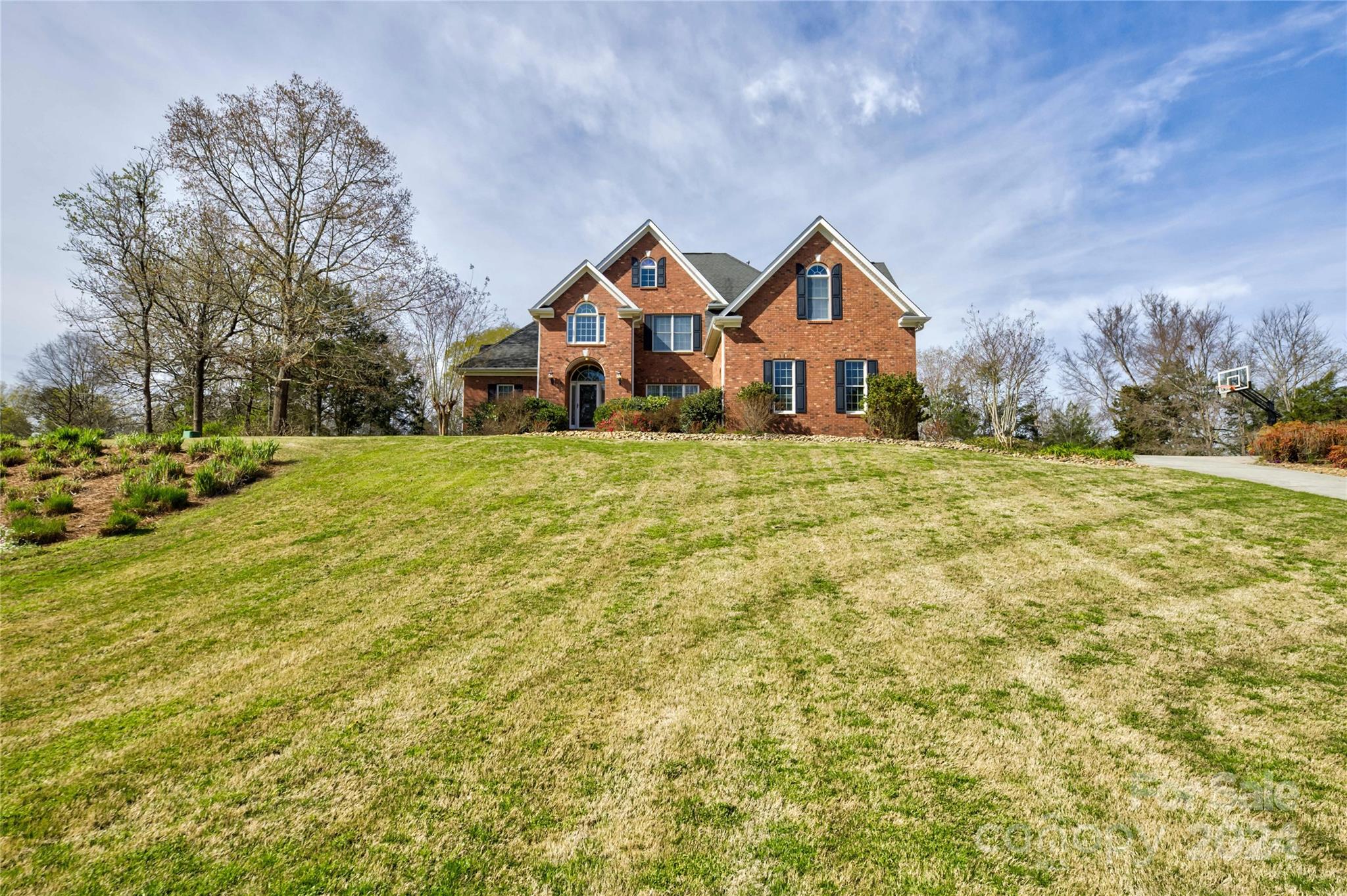 a house with trees in the background