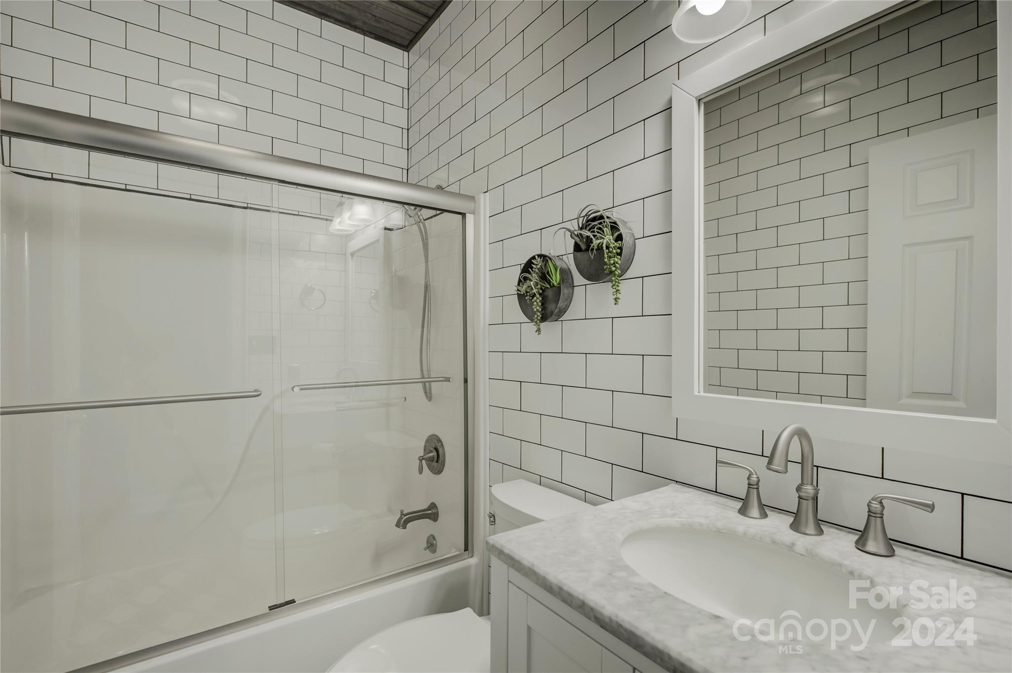 125 Clearview Road Rock Hill, SC 29732 - Photo 22 of 48 a bathroom with a granite countertop sink a toilet and shower