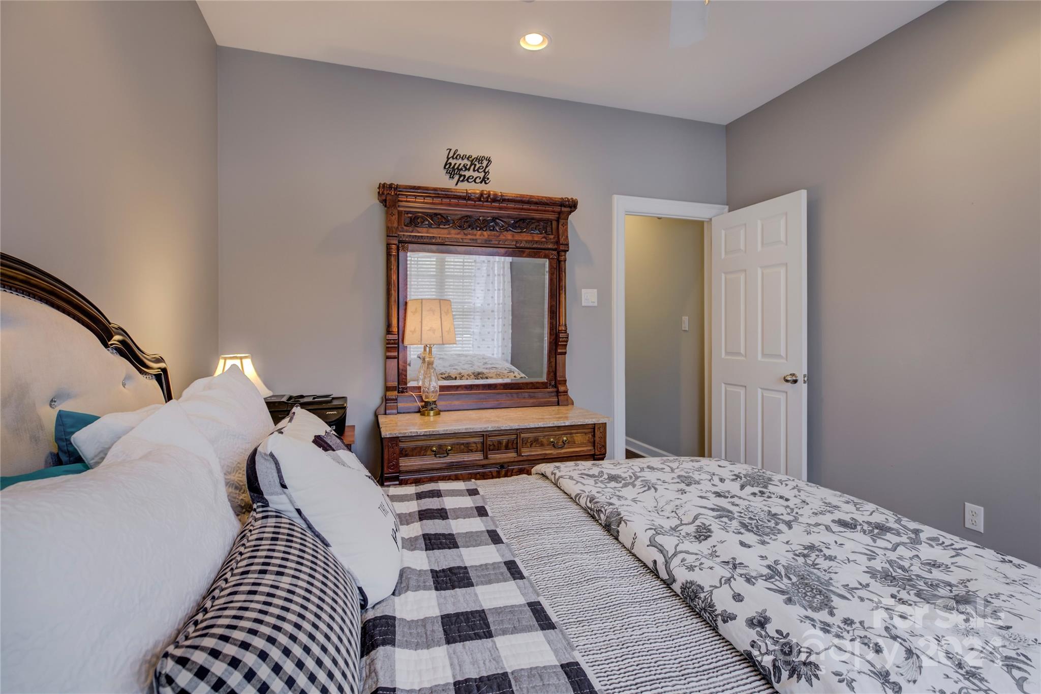 125 Clearview Road Rock Hill, SC 29732 - Photo 25 of 48 a bedroom with a bed and wooden floor