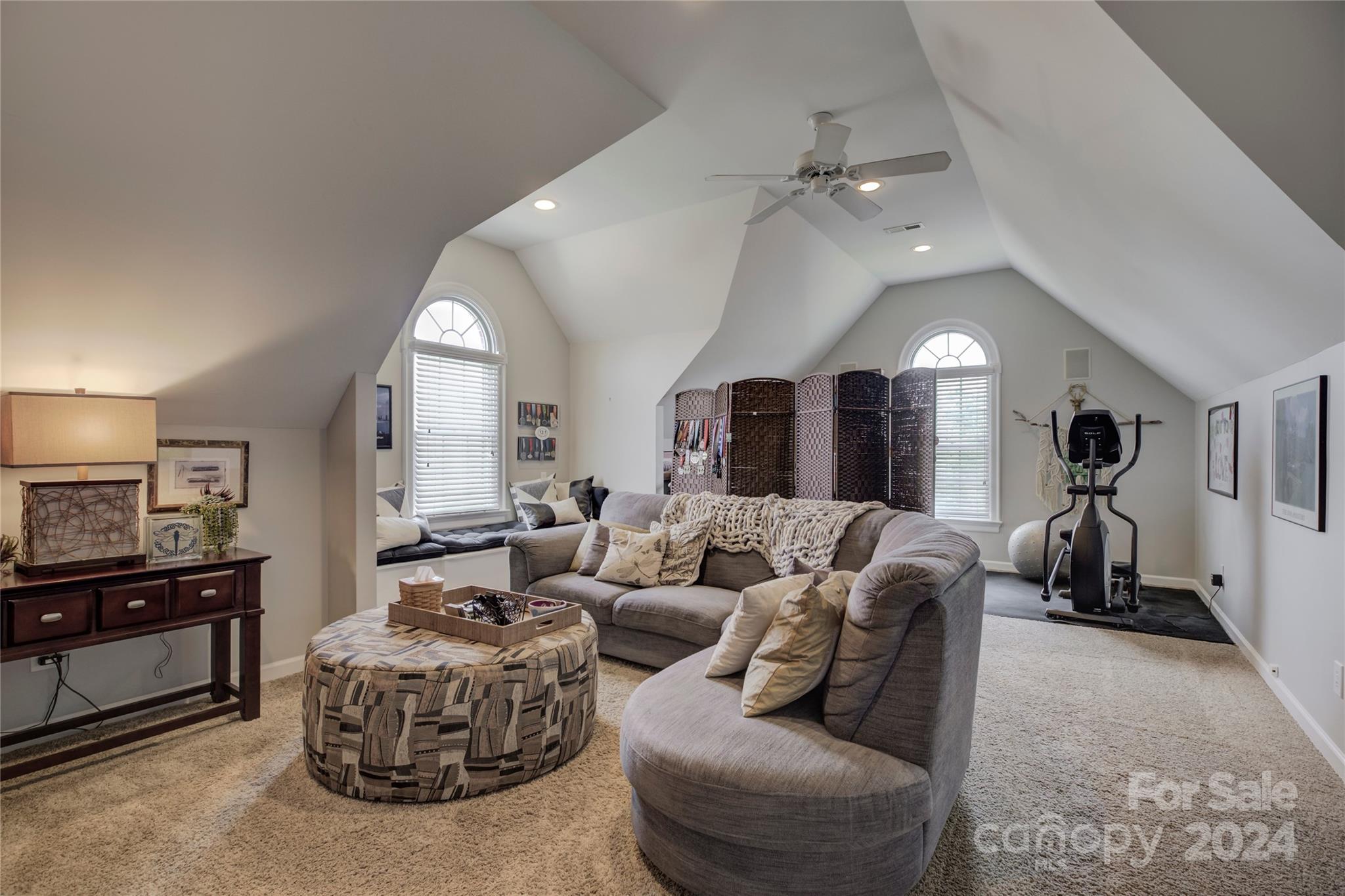 125 Clearview Road Rock Hill, SC 29732 - Photo 34 of 48 a living room with furniture a large window and a chandelier