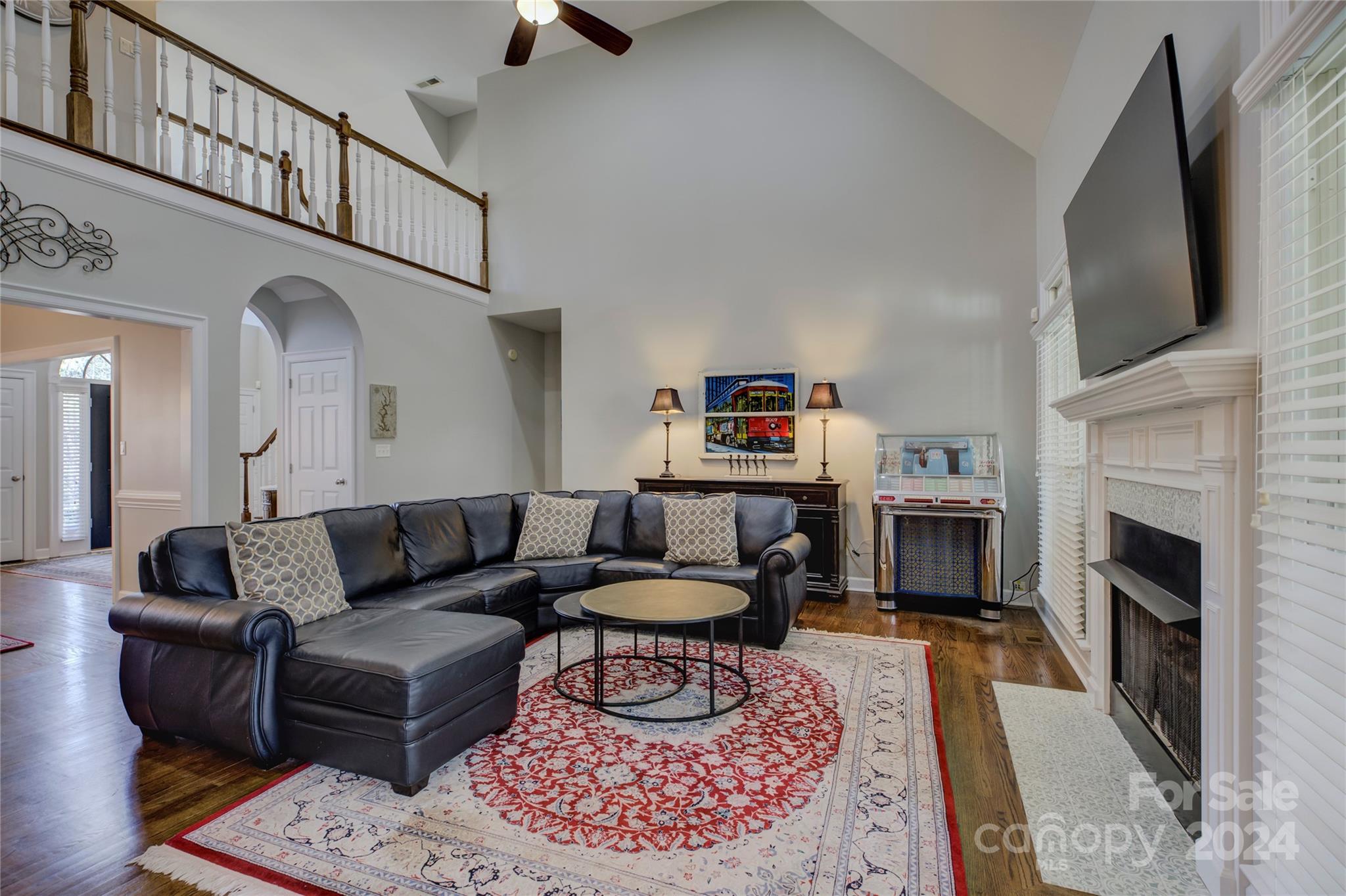 125 Clearview Road Rock Hill, SC 29732 - Photo 8 of 48 a living room with furniture a flat screen tv and a fireplace
