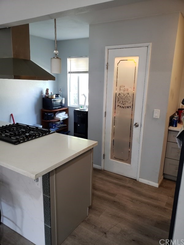710 Claraday Street Glendora, CA 91740 - Photo 11 of 17 a kitchen with a sink a refrigerator and cabinets