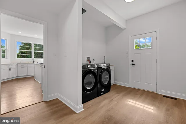 a work room with furniture and windows