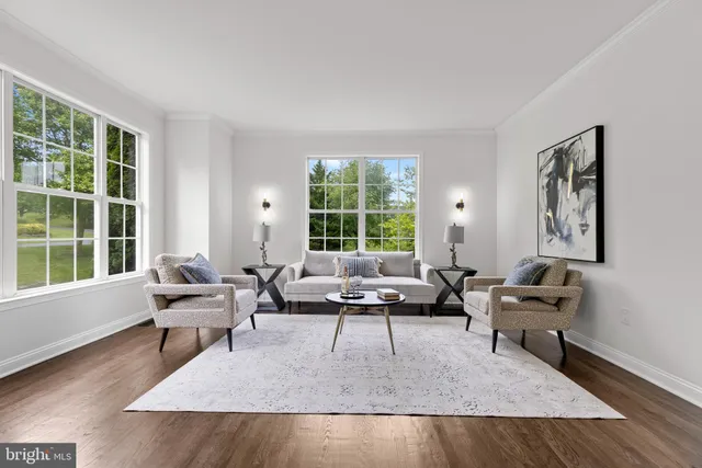 a spacious bedroom with a bed and a couch