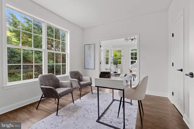 a bathroom with a shower and a bath tub